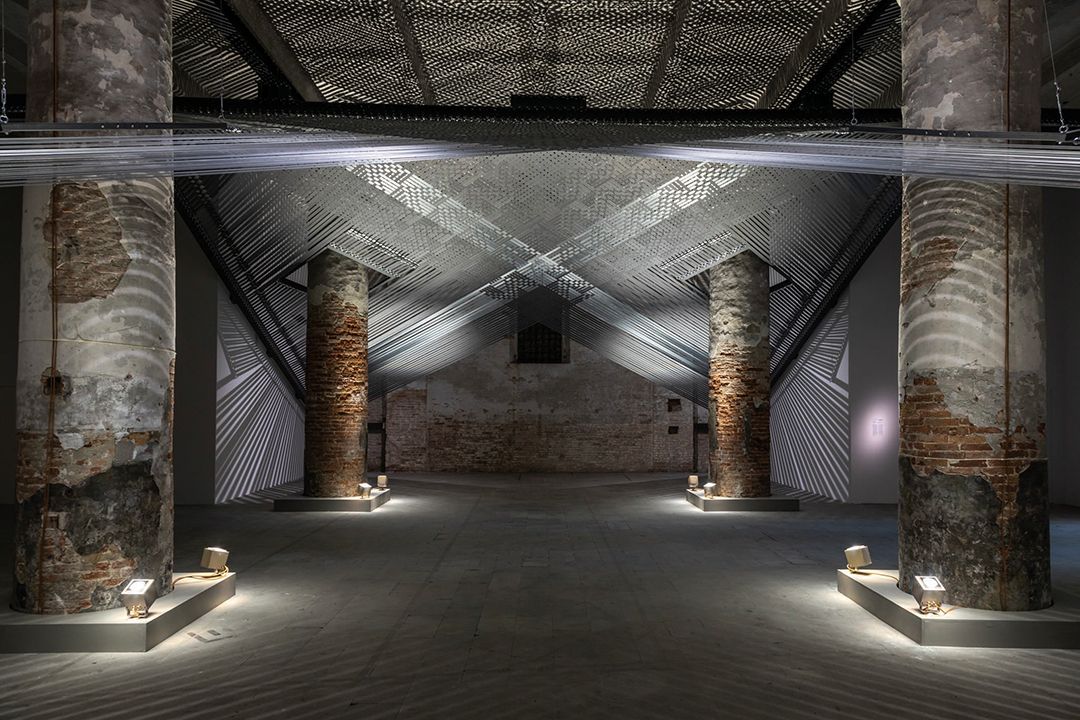 Mataaho Collective, <Takapau>, 2022, Installation (polyester hi-vis tiedowns, stainless steel buckles and j-hooks ) Site specific reconfiguration Museum of New Zealand, Te Papa Tongarewa. Photo: Marco Zorzanello