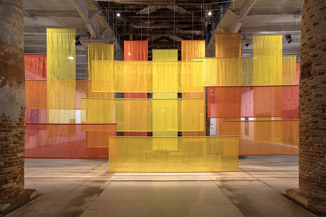 Dana Awartani, <Come, let me heal your wounds. Let me mend your broken bones>, 2024, Darning on medicinally dyed silk 520x1250x297cm. Photo: Marco Zorzanello