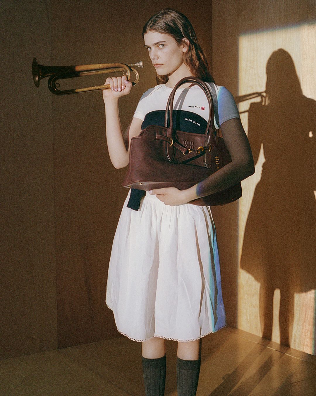 miu miu 슬러브 포플린 스커트, 2백45만원. Petit Bateau X Miu Miu 레귤러 스트레치 저지 티셔츠, 78만원.