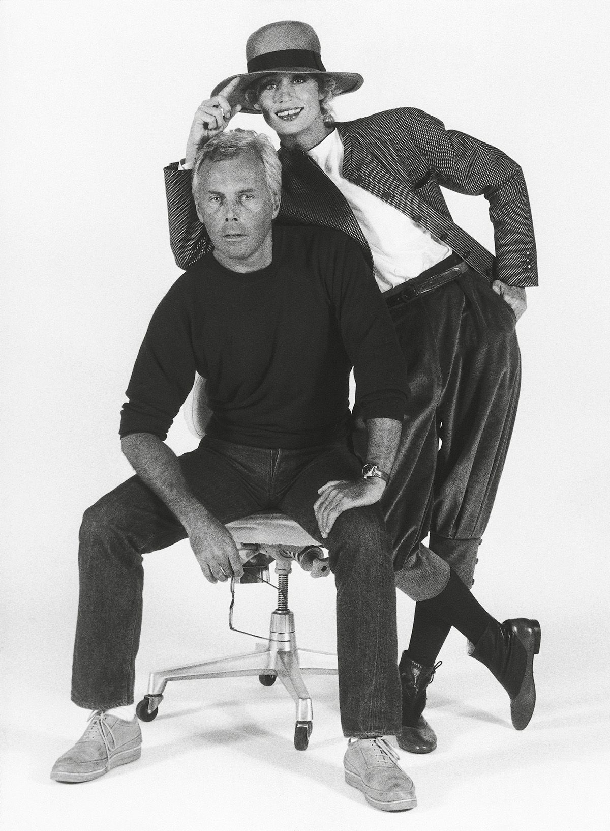 영화 <아메리칸 지골로>의 배우이자 모델 로렌 허튼과 함께 포즈를 취한 조르지오 아르마니, 1980년.