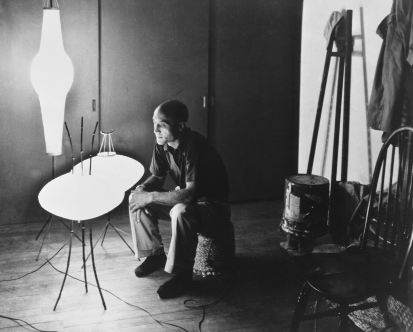 Isamu Noguchi with Akari light sculptures in Japan, c. 1950s. The Noguchi Museum Archives, 07022. ©INFGM / ARS
