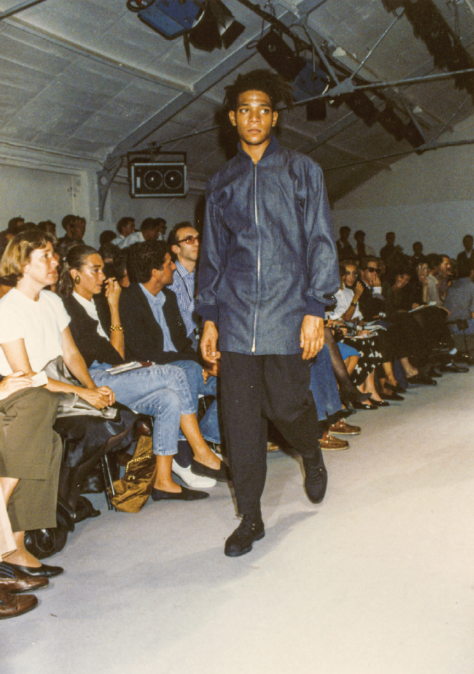 Jean Michel Basquiat modelling at a Comme des Garçons show. Photo_ Comme des Garçons.