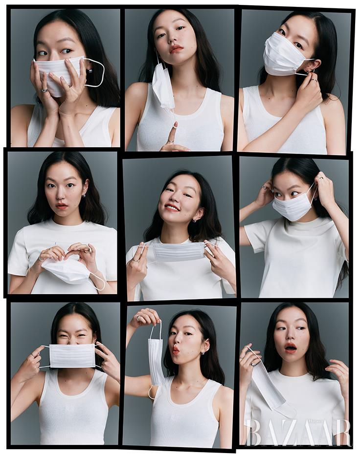 슬리브리스 톱은 Loewe. 티셔츠는 Cos. 다이아몬드와 블루 사파이어 세팅의 ‘포제션’ 컬렉션 귀고리는 Piaget. 양손에 레이어드한 반지는 모두 코코 크러쉬 컬렉션 Chanel Fine Jewelry.