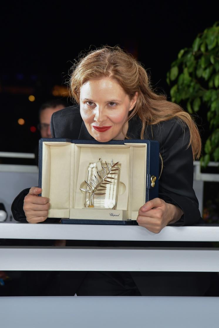 CANNES, FRANCE - MAY 27: Justine Triet poses with The Palme D'Or Award for 'Anatomy of a Fall' during the Palme D'Or winners at the 76th annual Cannes film festival at Palais des Festivals on May 27, 2023 in Cannes, France. (Photo by Dominique Charriau/WireImage)