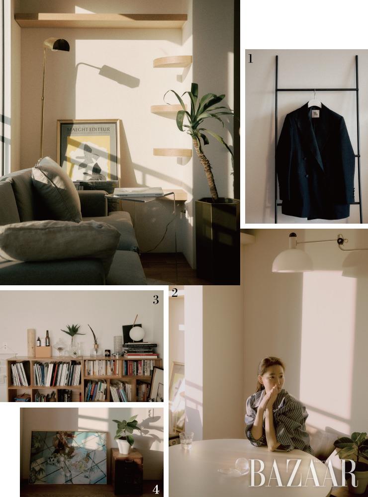 1 김서룡의 블랙 턱시도 재킷. 2 거실 원형 테이블에 앉아 있는 송선민. 3 컬렉팅하는 투명한 오브제들이 집 안 곳곳에 자리하고 있다. 4 포토그래퍼 신선혜가 선물한 작품과 시가현 앤티크 숍에서 구입한 서랍장.