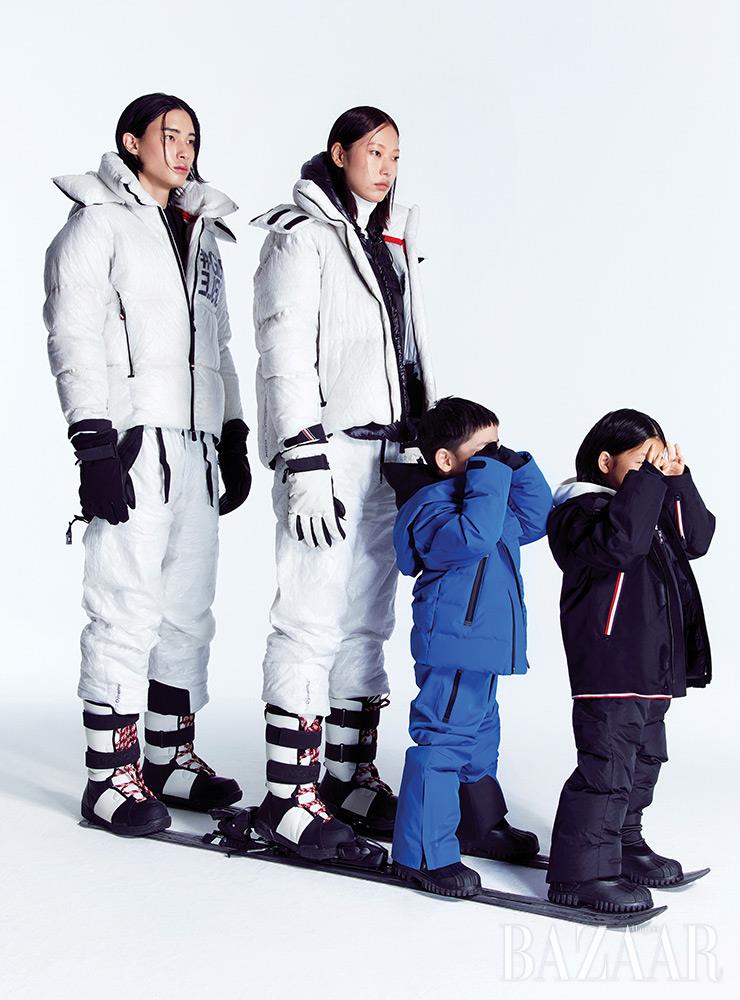 (왼쪽부터) 진영이 입은 아우터, 팬츠, 장갑, 부츠는 모두 3 Moncler Grenoble. 티셔츠는 Moncler Grenoble. 희정이 입은 아우터, 베스트, 터틀넥, 팬츠, 장갑, 부츠는 모두 3 Moncler Grenoble. 도와 진이 입은 아우터, 후디, 팬츠, 부츠는 모두 Moncler Grenoble Enfant.