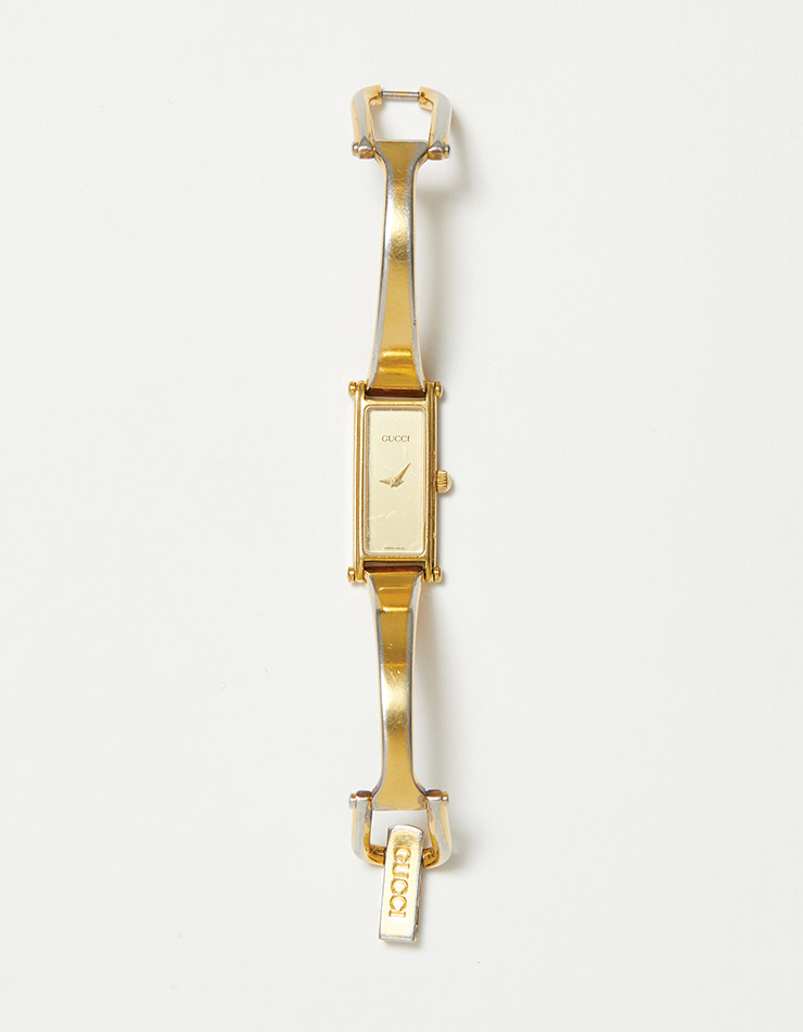 엄마에게 물려받은 시계는 Gucci.