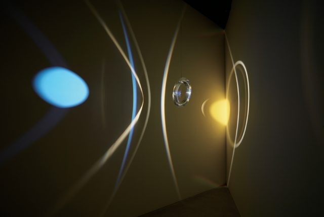 ＇Your museum primer＇, Acrylic prism ring, colour effect-filter glass (yellow), spotlight, LED light, motor, wire, Dimensions variable, 2014