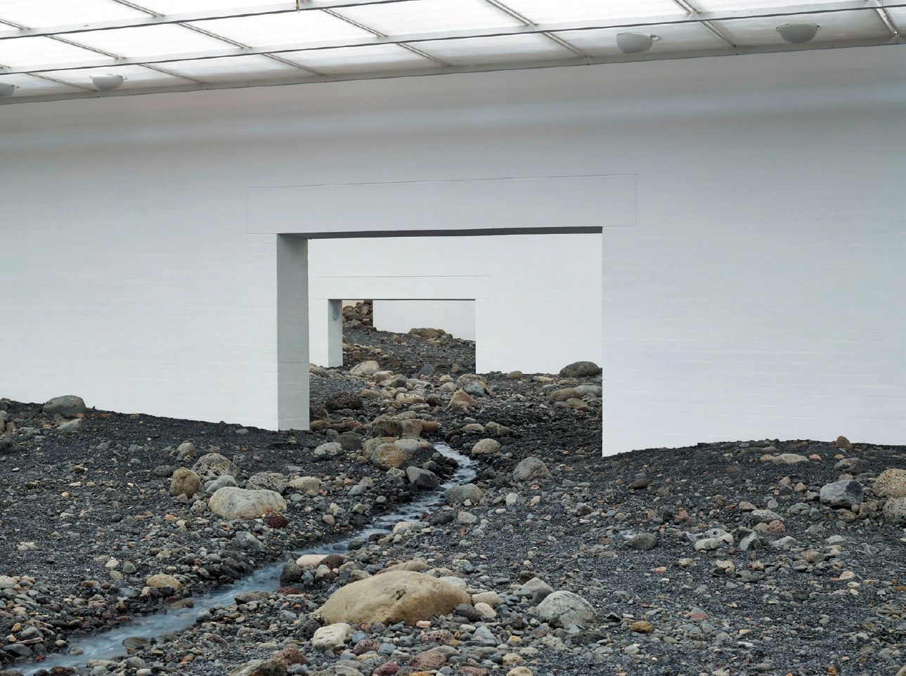 <strong>'Riverbed'</strong>, Water, blue basalt, wood, steel, foil, hose, pumps, cooling unit, Louisiana Museum of Modern Art, Humlebaek, Denmark, 2014 Photo: Anders Sune Berg Courtesy of the artist;  neugerriemschneider, Berlin; and Tanya Bonakdar Gallery, New York © Olafur Eliasson 